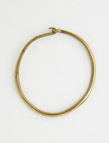 Gold hoop earring - image 1