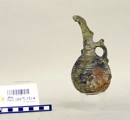 Small Black Slip I jug with beaked mouth - image 1