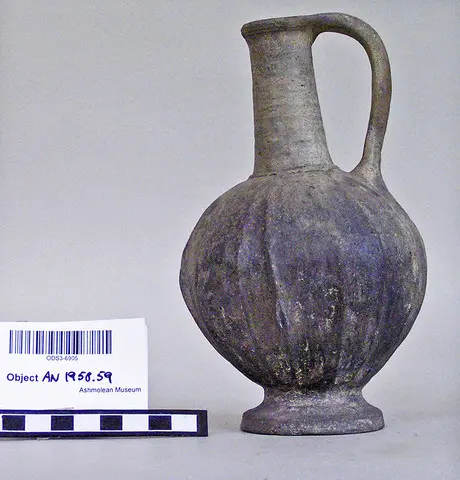Wheel made bucchero jug - image 1