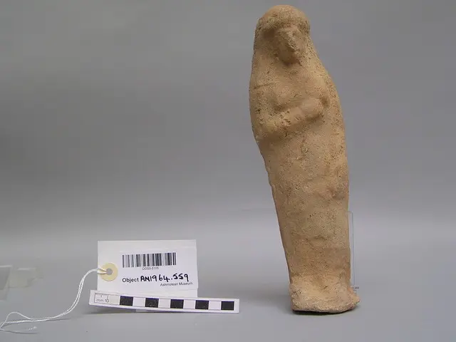 Terracotta figurine of female votary supporting her left breast with right hand (Cypriot Astarte-figurine) - image 1
