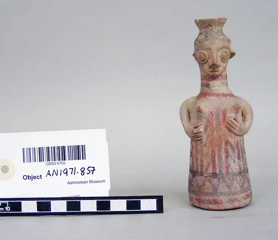 Base Ring figurine vase of clothed female touching her breasts - image 1