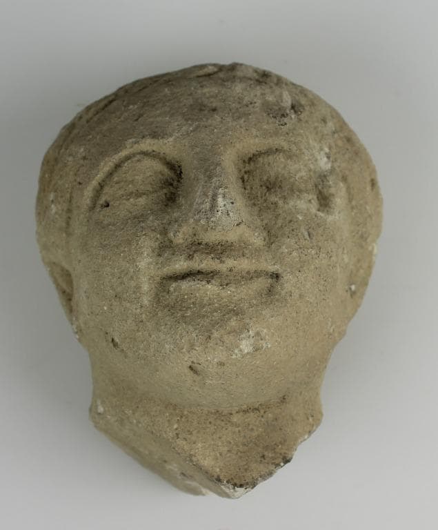 Head from a votive statuette - image 1