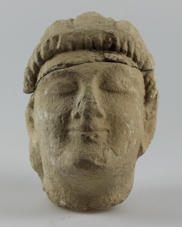 Head from a votive statue - image 1