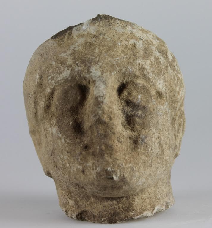 Head from a votive statuette - image 1