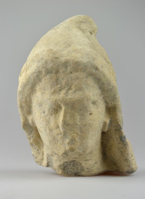 Head from a votive statuette - image 1