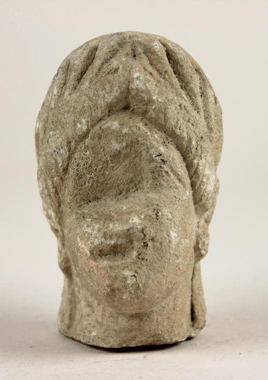 Head from a votive statuette - image 1