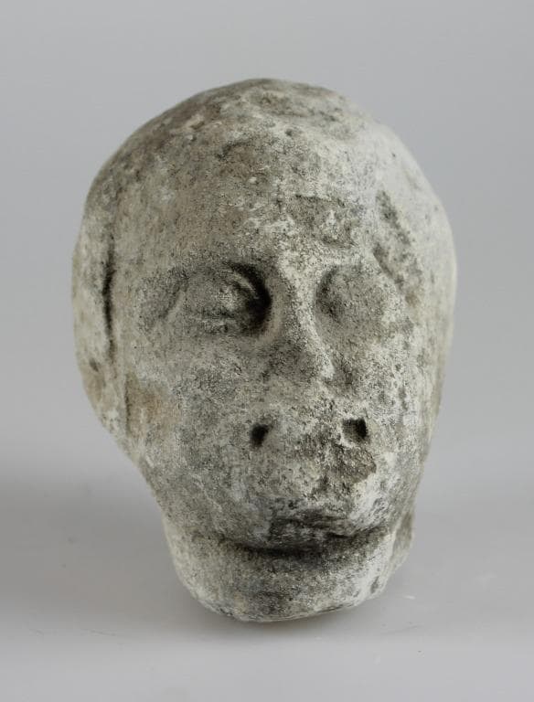 Head from a votive statuette - image 1