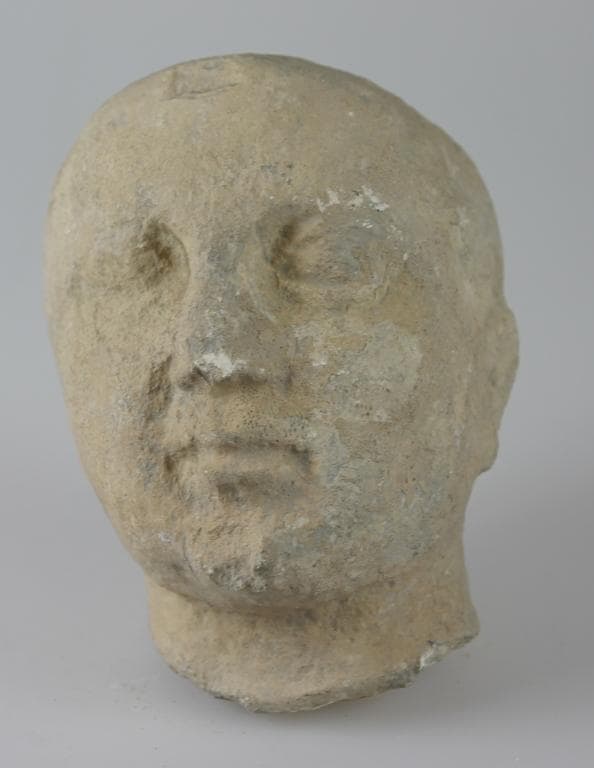 Head from a votive statue - image 1