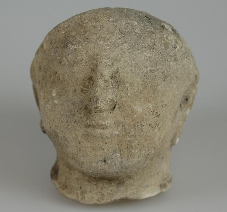 Head from a votive statuette - image 1