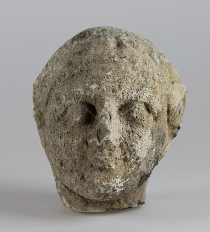 Head from a votive statuette - image 1