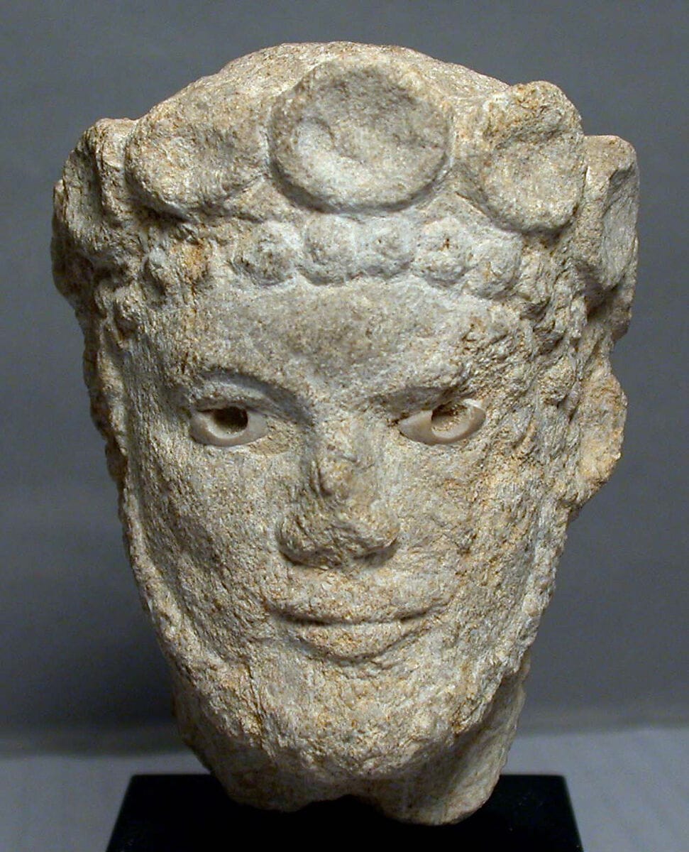 Limestone head of a bearded man - image 1