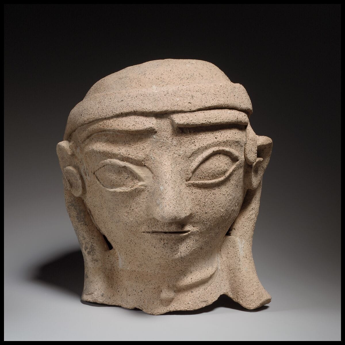 Terracotta head of a woman - image 1