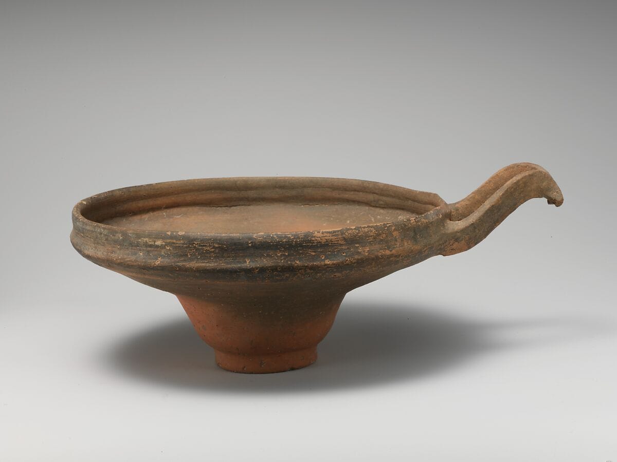 Terracotta bowl with wishbone handle - image 1