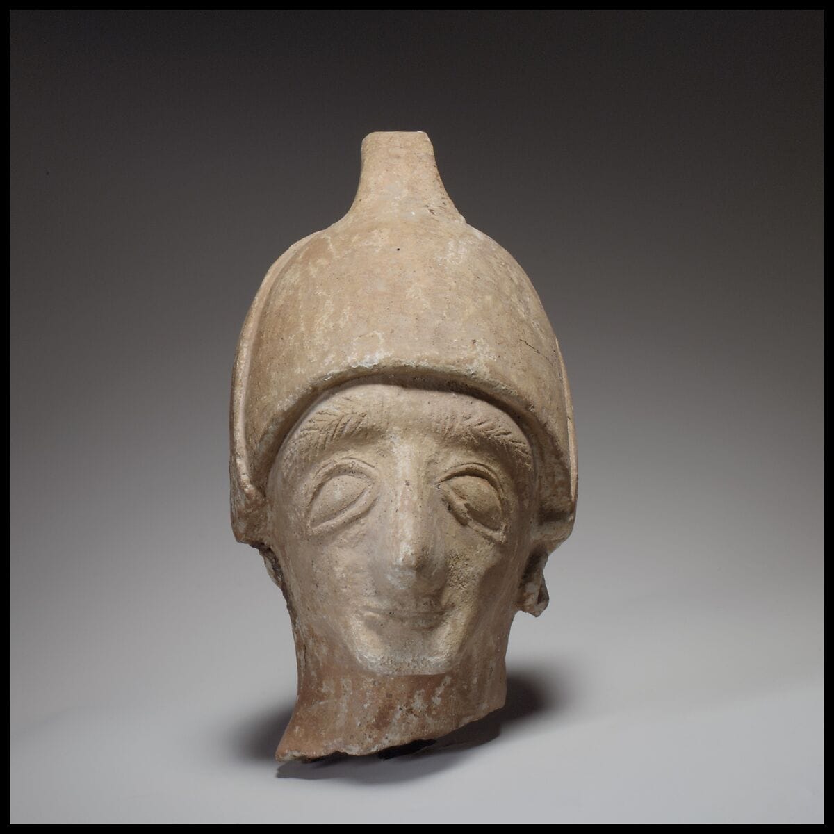 Male head wearing a helmet - image 1
