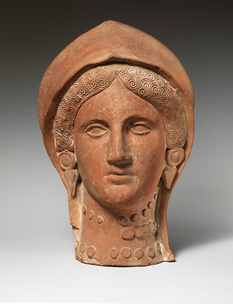 Terracotta head of a woman wearing a stephane - image 1