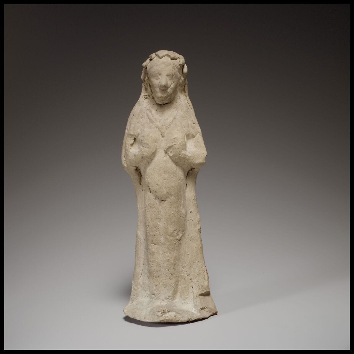 Terracotta statuette of a woman - image 1
