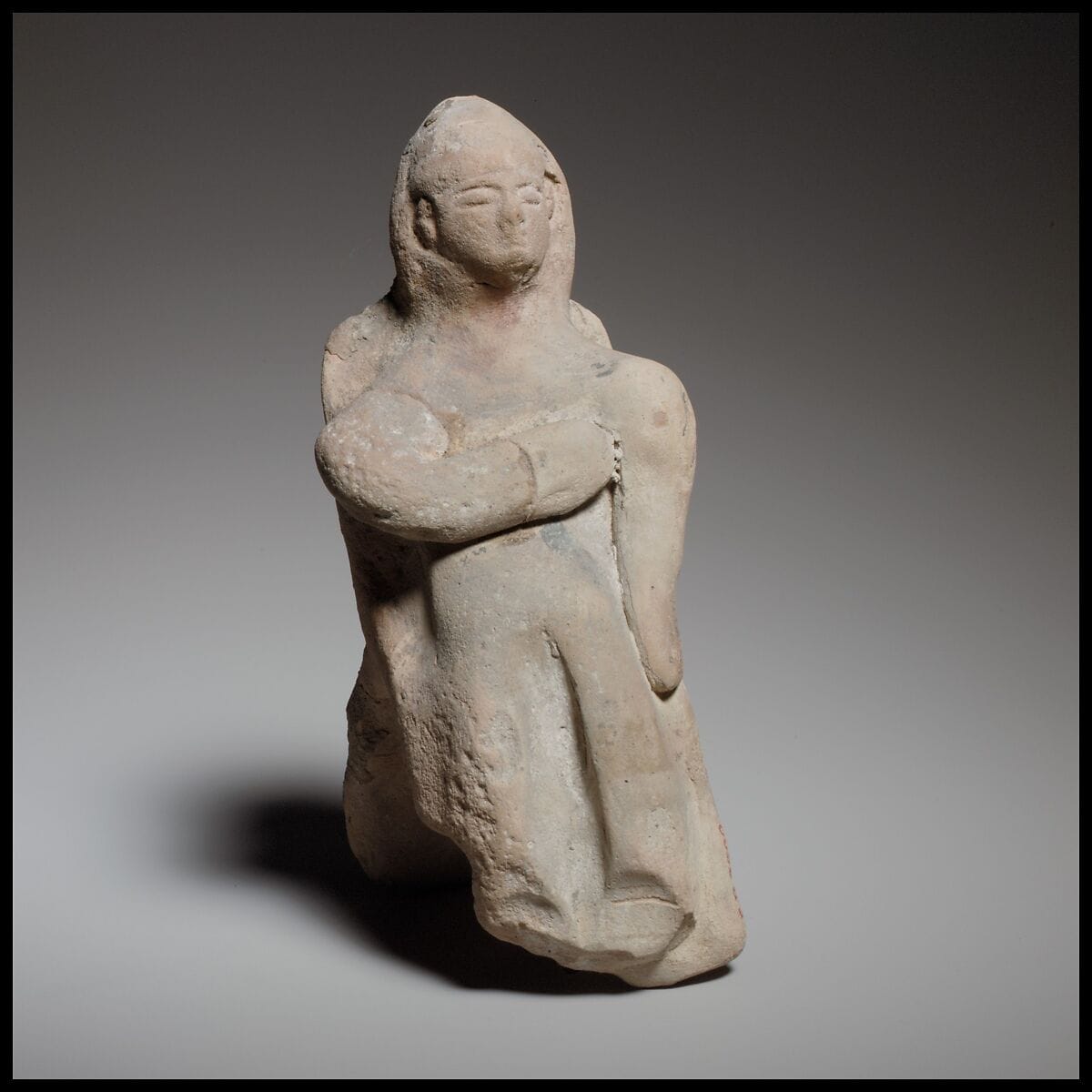 Seated female figurine - image 1