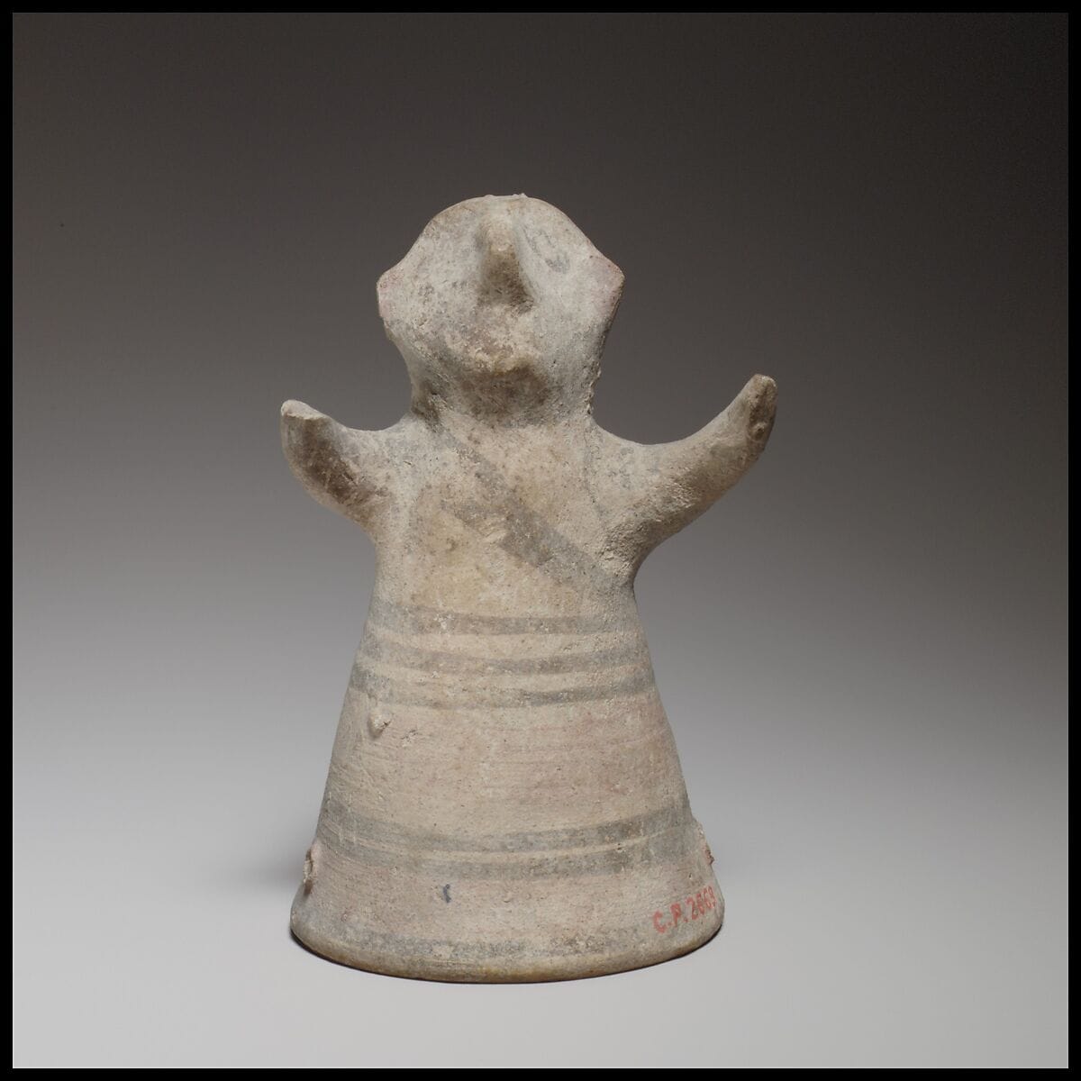 Standing male figurine with uplifted arms - image 1