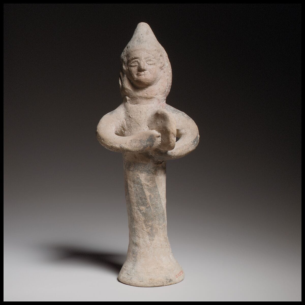 Terracotta statuette of a woman playing the tambourine - image 1