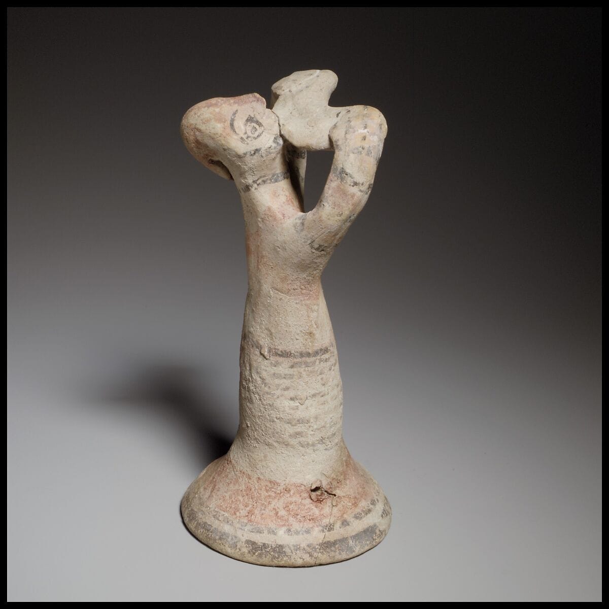 Terracotta statuette of a male flute-player - image 1