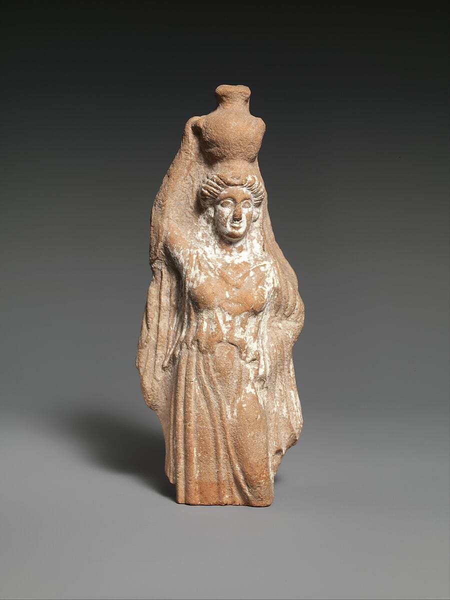 Terracotta statuette of a female votary carrying a hydria - image 1