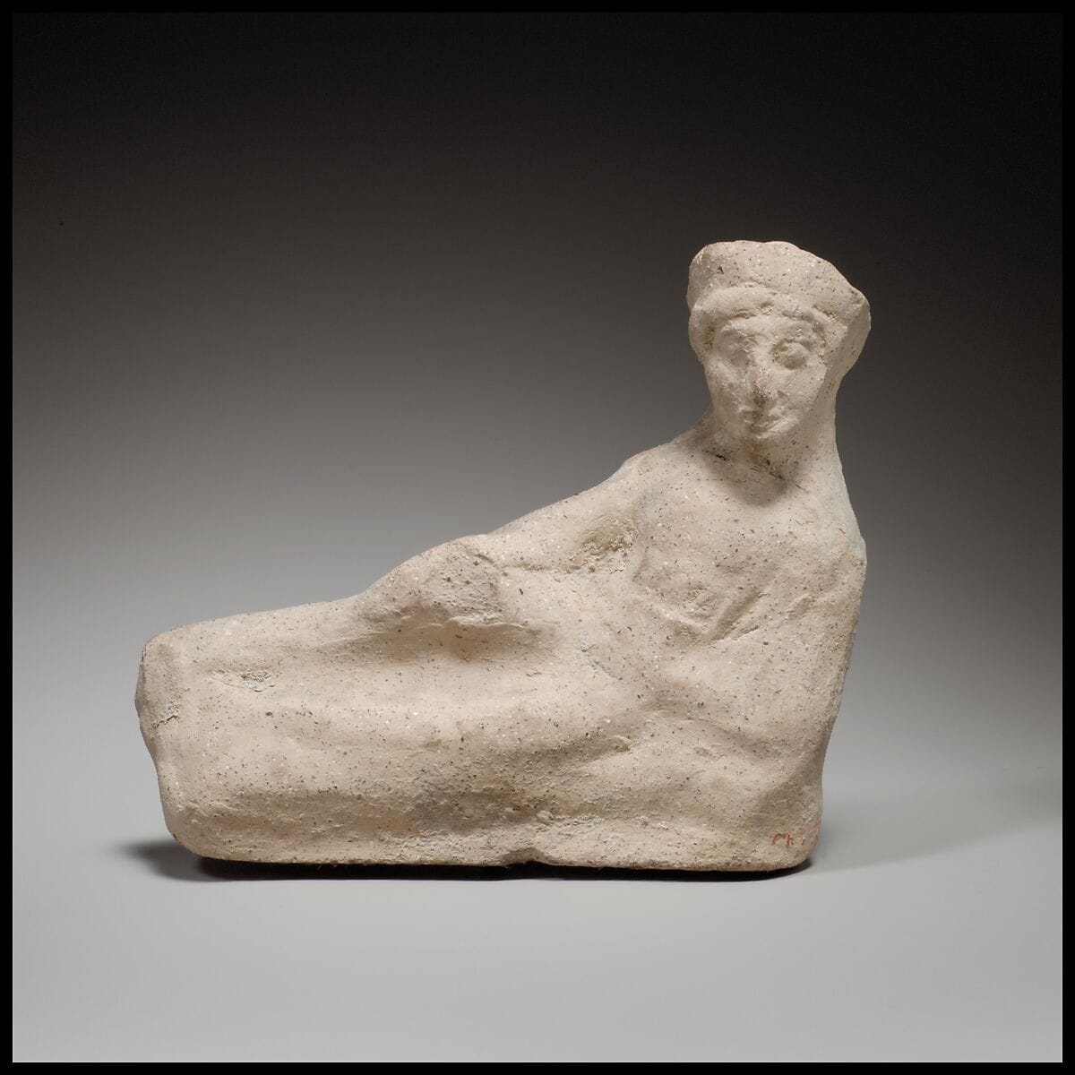Terracotta statuette of a reclining youth - image 1