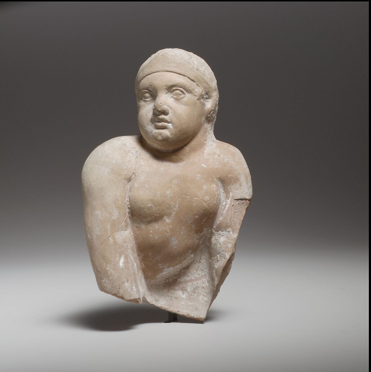 Terracotta statuette of a seated or crawling boy - image 1