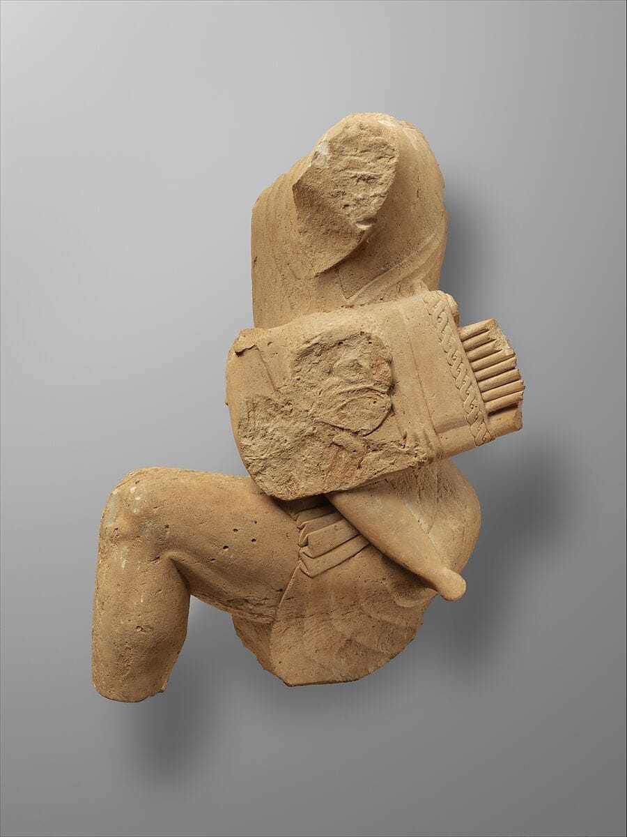 Limestone figure of kneeling Herakles - image 1