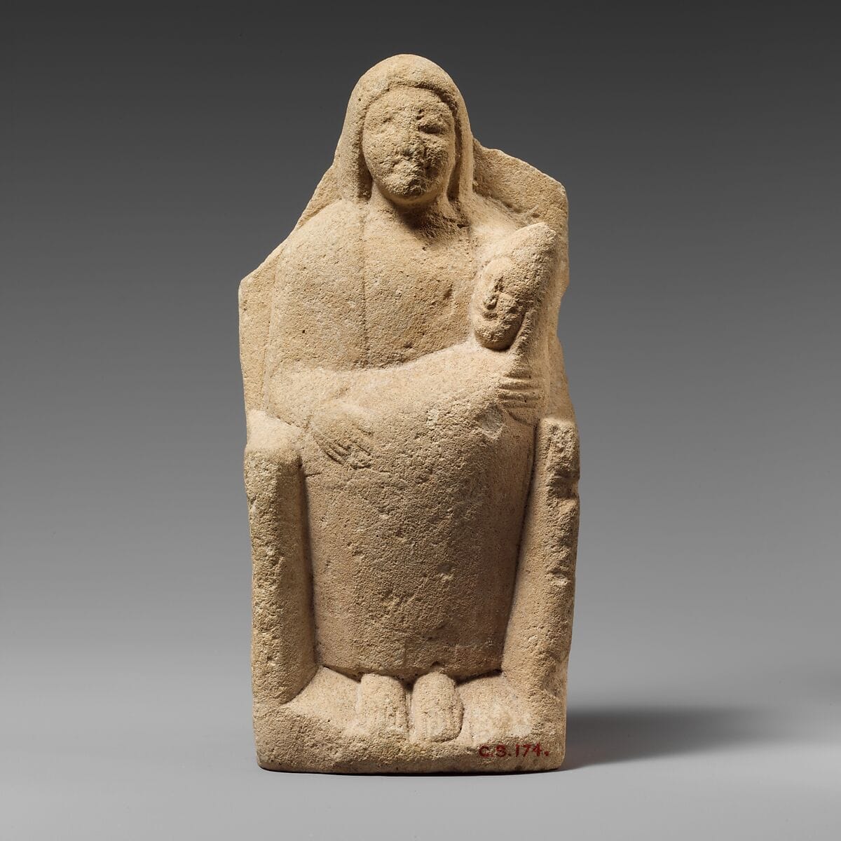 Seated limestone kourotrophos - image 1