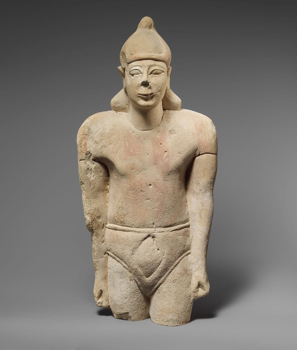 Limestone statuette of a male votary with Cypriot shorts and an Egyptian crown - image 1