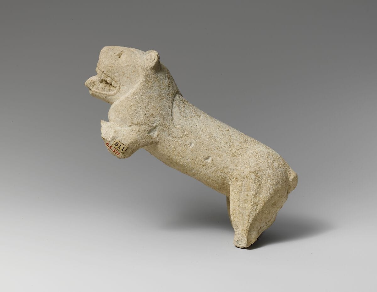 Limestone statuette of a lion - image 1