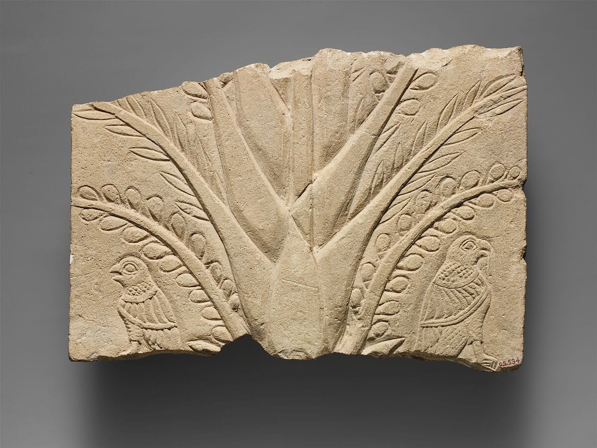 Fragment of a limestone relief with a tree and birds of prey - image 1