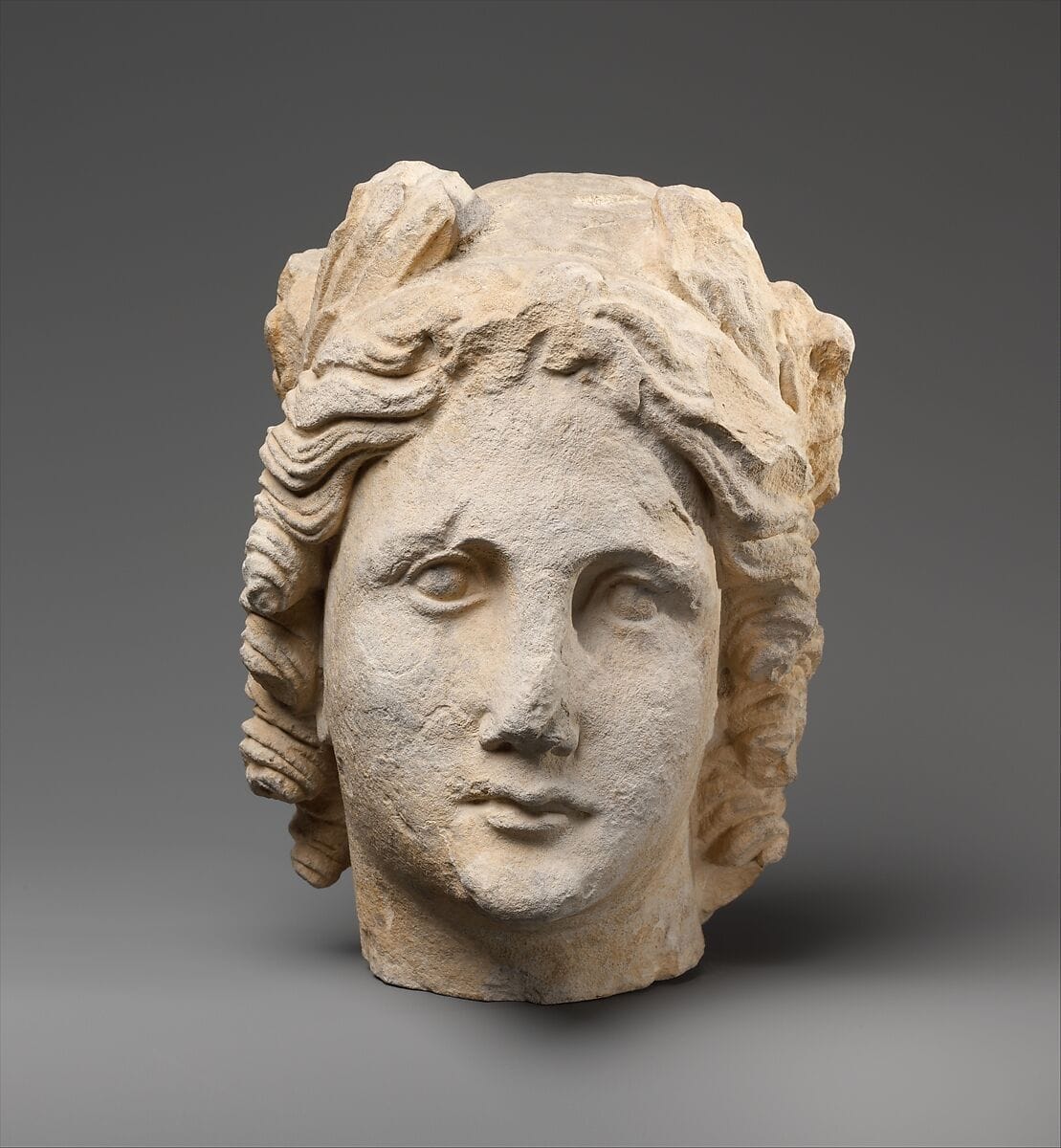Limestone head of Apollo - image 1