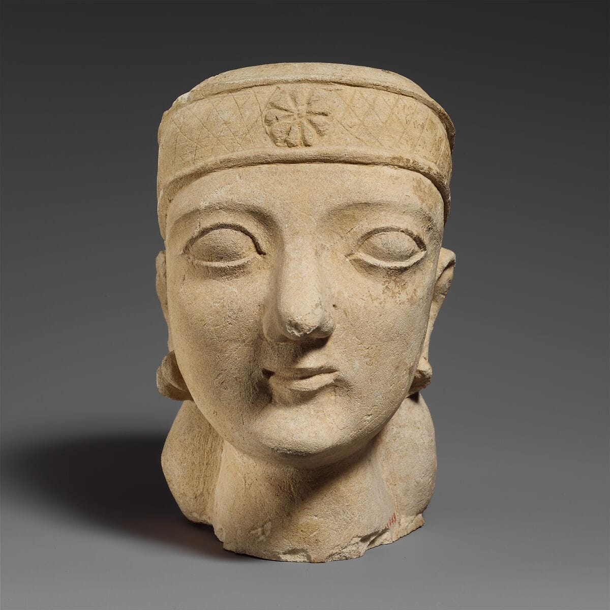 Limestone head of a beardless male with a diadem - image 1