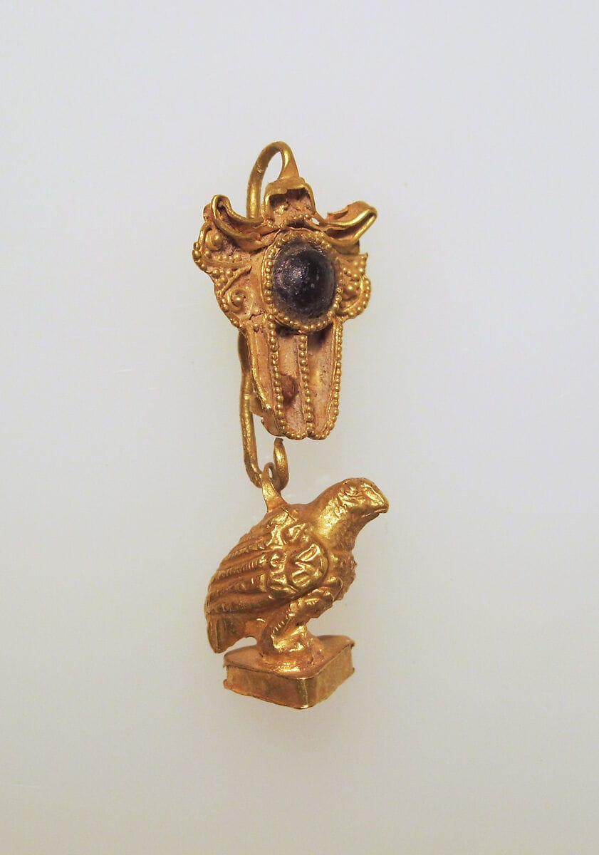 Earring with hawk pendant - image 1