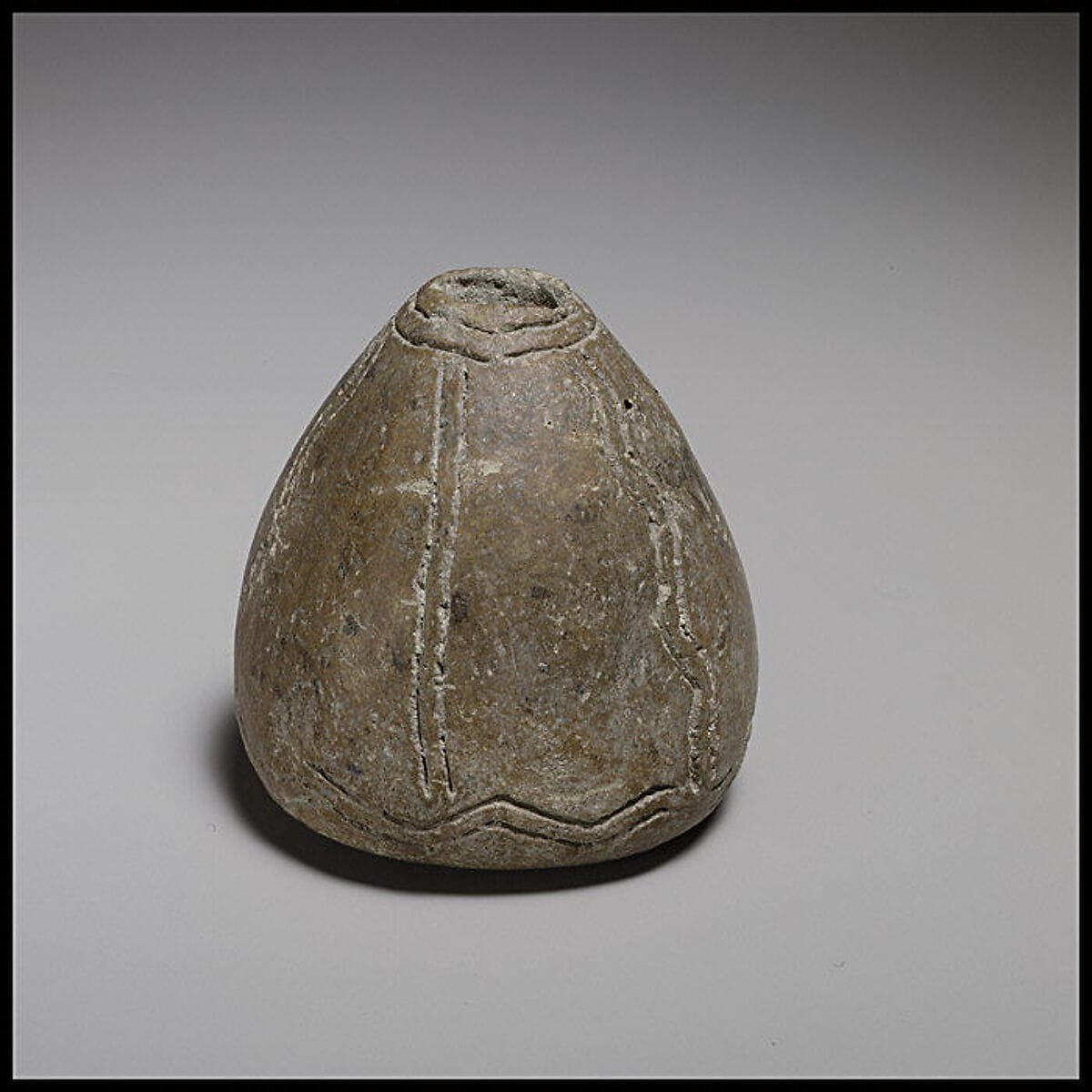 Terracotta conical-hemispherical spindle-whorl with slightly rounded base - image 1