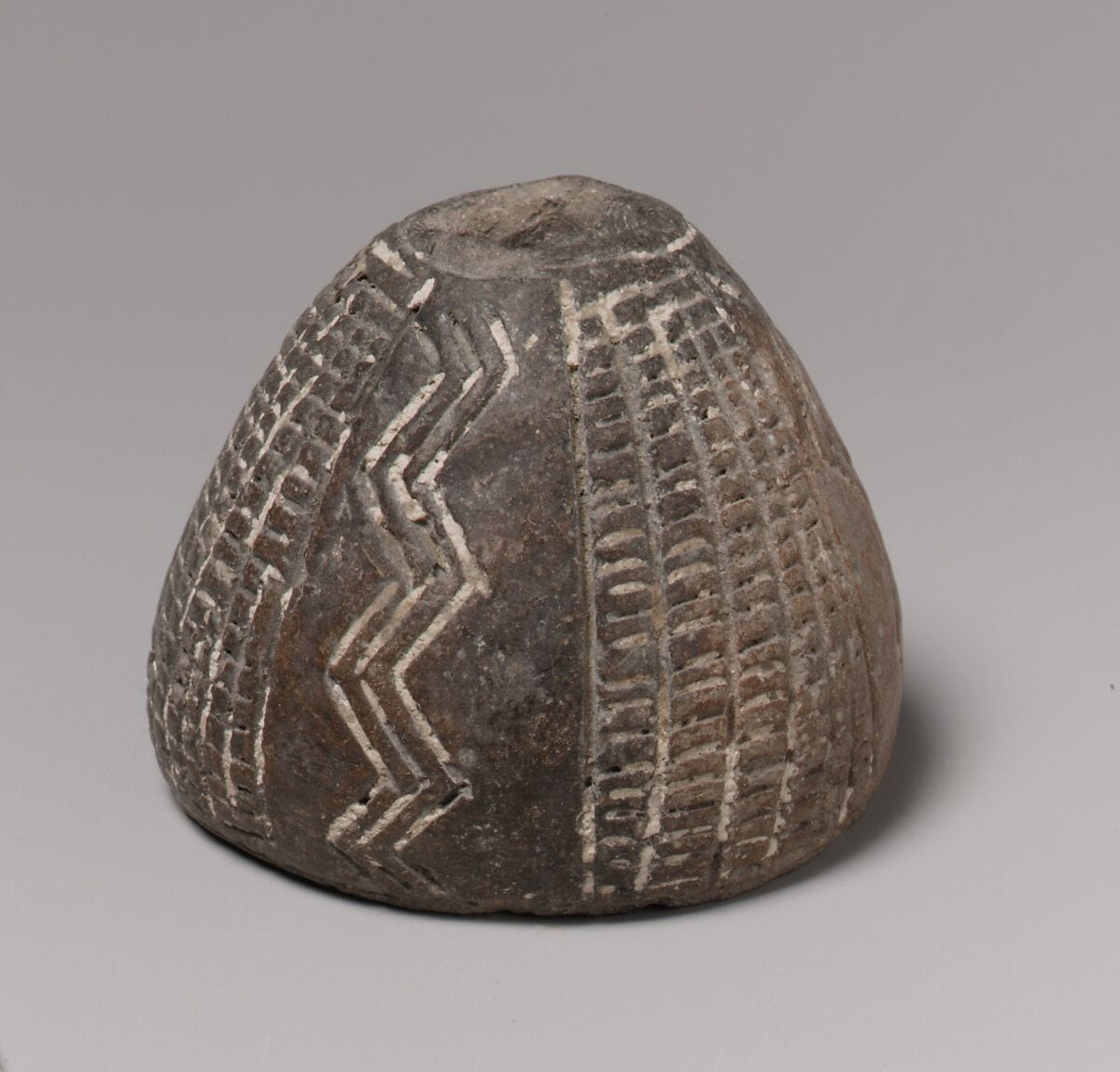 Terracotta spindle whorl - image 1